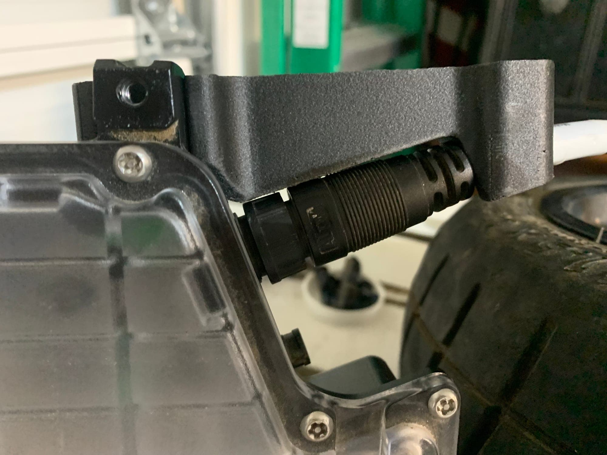 Motor harness retainer